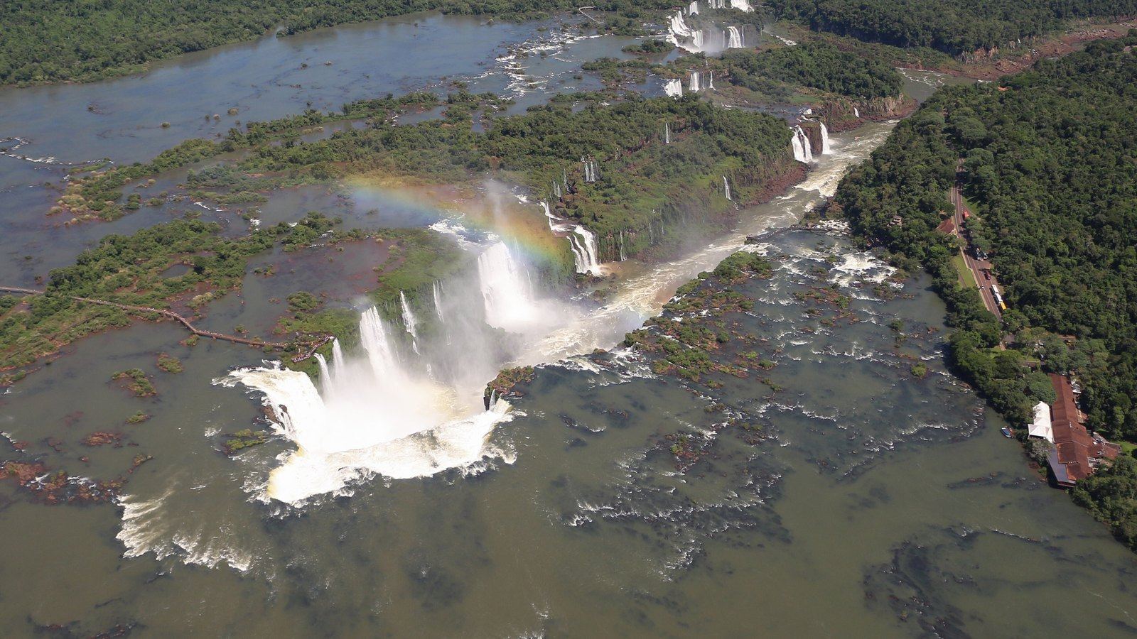 Aerial view of the Devil's Throat and the Iguaçu Falls with a rainbow