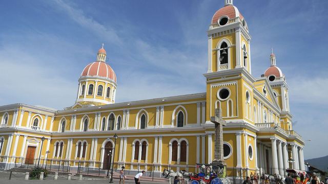 The yellow cathedral and colonial houses of Granada