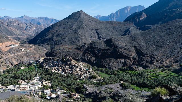 The village of Balad Sayt with terraced fields between the mountains