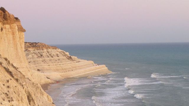 The white marl cliffs of the Scala dei Turchi above the sea