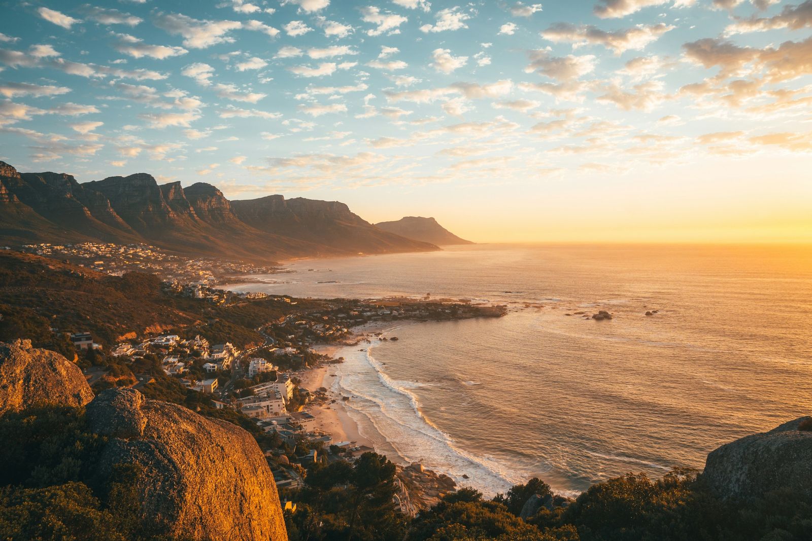 The Twelve Apostles and the bay near Cape Town in golden evening light